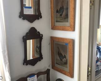 pair of Chippendale mirrors and old prints