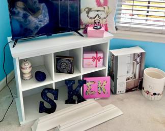 White Bookshelf, Flatscreen TV, and Décor 