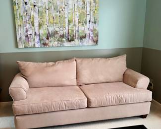 Tan Sofa and Wall Art