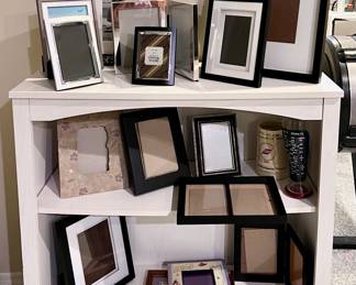 White Bookcase and Picture Frames