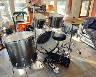 Pearl Roadshow Drum set, Pearl Bronze( this is a bright sunroom, they are bronze)