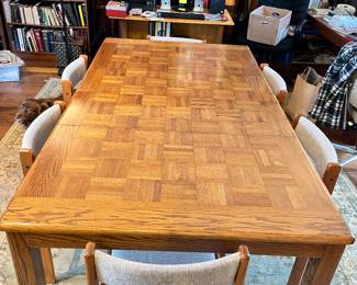 Danish midcentury parquet top table (pictured with the 2 leaves in) with 6 chairs
