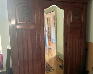 Antique armoire. Comes apart in 8 pieces for easy moving! For sale during in-person shopping hours.