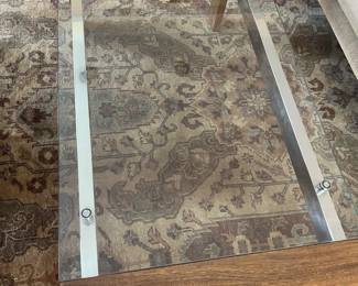 $280. Glass, metal and wooden coffee table. 47"w x 24"d x 18"h. Available for online purchase beginning Wednesday, January 22nd starting at 7pm. All online purchases are final. Please see details on how to do it in our sale description.