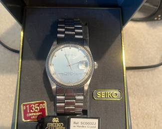 one of several watches for sale along with jewelry and sterling silver not yet onsite during in-person shopping hours.