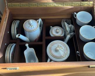 $600. Trade Winds in red by Copeland Spode tea service for 8 in a wooden trunk. Perfect condition.