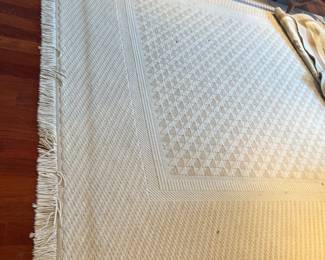 $420. Cream colored wool rug. 11' x 7'9". For sale during in-person shopping hours.