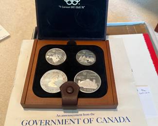 one of several coin sets for sale along with jewelry and sterling silver not yet onsite during in-person shopping hours.