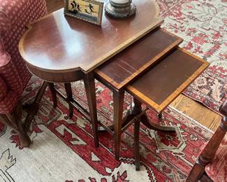 $120. Antique nesting tables. As found largest one has some sun fading as you can see from the difference with the shorter ones. Largest one is 26"w x 15"d x 22.5"h. Beautiful trim on tops of each one. Available for online purchase beginning Wednesday, January 22 starting at 7pm. All online purchases are final. Please see details on how to do it in our sale description.