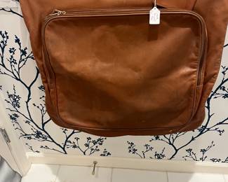 Coach garment bag for sale during in person shopping hours.