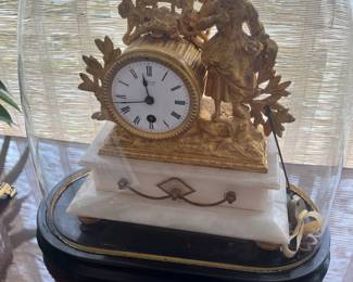 $1900. Louis XV style marble and ormolu white metal mantle clock with glass bell. 1860-1880. Believed to have been purchased at a Governor's mansion auction. Available for online purchase beginning Wednesday, January 22 starting at 7pm. All online purchases are final. Please see details on how to do it in our sale description.