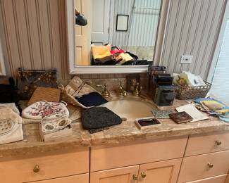 Overview of handbags and other items sold during in person shopping hours only.