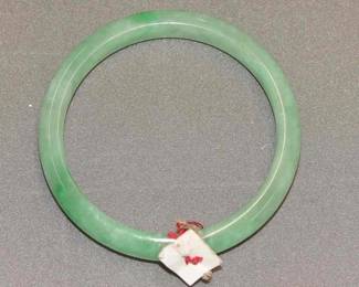  Green Bracelet appears to be Jade