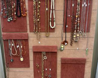 AGAIN, we have lots of jewelry - some costume - and lots of silver and gold (in the display case).