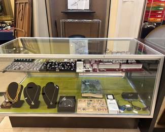 Pictures in the display case are hard to see, but some really beautiful pieces - sterling and gold