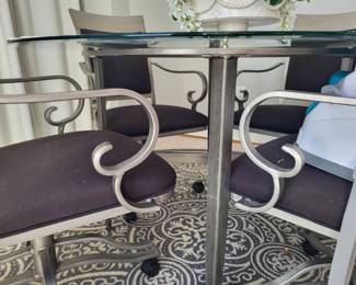 Kitchen table - glass and metal. Pet free and smoke free home. Very good condition