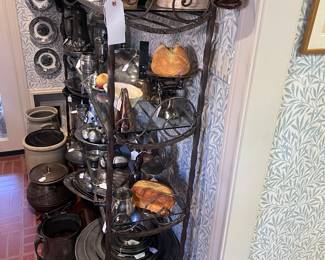 Side view of French antique bakers rack