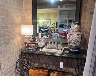 Giant antique jar with lid, marble top iron console (2 available), large hand carved mirror (2 available)