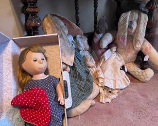 Poor, Pitiful Pearl doll and other dolls and stuffed bunnies