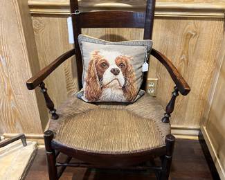 Antique rush seat chair, needlepoint pillow