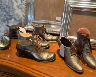 Collection of antique pin cushion shoes and ink wells