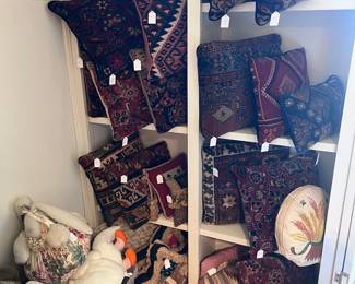 Tapestry, needlepoint and quilted pillows. 