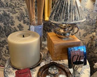 Silver plate tea pot lamp with custom toile shade, Gorsuch acorn tray, vintage dome paperweights, bundles cat tails, custom toile skirted table
