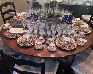 Beautiful round dining table with brass casters, has two leaves that turns it into a very unique oval!  Set of 8 Neiman Marcus chairs (2 armchair)