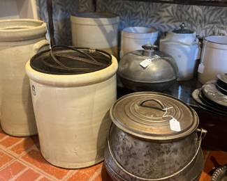 Antique crocks, pewter bed warmer, large iron pot with lid