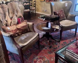 Pair of green leather chairs