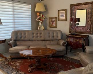 Italian Leather Sofa, 2 Chairs, 2-Drawer Chest, Inlaid End Table, Inlaid Coffee Table, Mondial Area Rug, Table Lamps, Vintage Jester Lamp, Art, Mirrors and more...