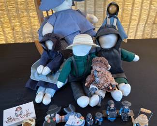 Amish dolls and cast iron figurines