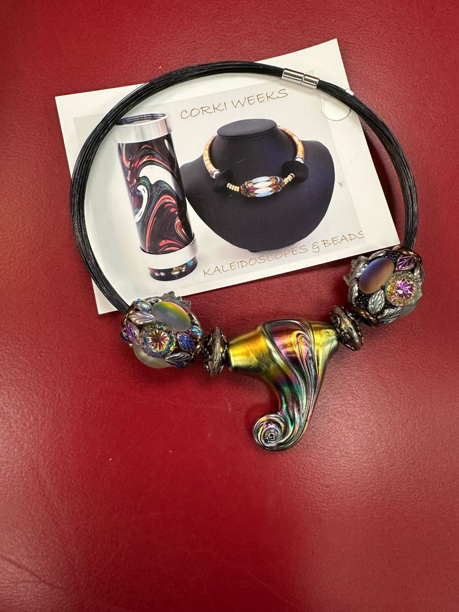 This is one of over 800 necklaces belonging to the estate.  There are over 80 costume and sterling rings.  Most of the costume jewelry is designer items like the above kaleidoscope bead necklace.