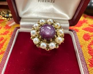 circa 1910 star ruby ring  surrounded in a ring of pearls, and set in 18kt, size 6
