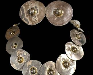 Silver And Gold Toned Hammered Metal Necklace And Earrings