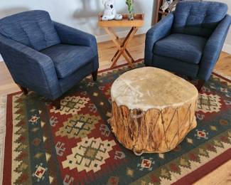 Two Blue Chairs by LazBoy - Log Drum Table (and yes, it really is a drum too! And it sounds great!) - Handwoven Carpet. 