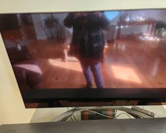 62" Lg Flat Screen. Lg Sound Bar. 