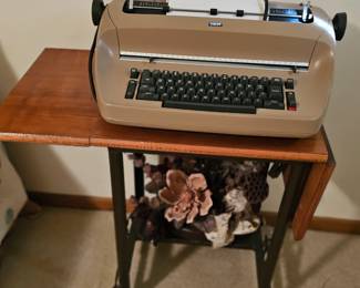 electric typewriter and office stand, sold separately
