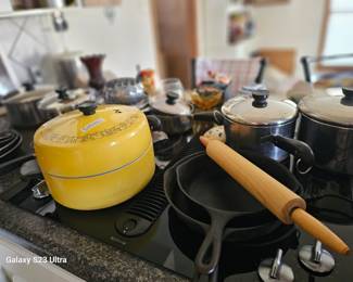 lots of pans, pots and cast 