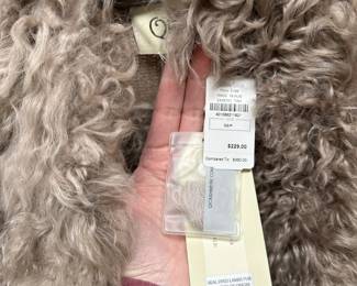 C92 - $75. XS - NWT. Neiman Marcus Tan Lamb Fur Vest. 