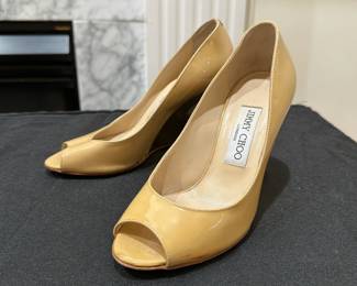 C117 - $125. Size 35. Jimmy Choo Nude Patent Leather with Gold Tone Wedge Heels. 