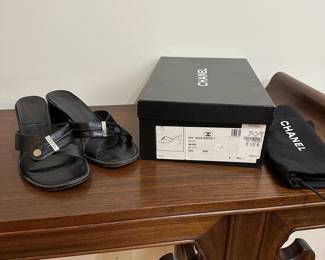 C127 - $75. Size 5.5. Chanel Shoes with Bag & Box. Black Mules. Bottoms are worn. 