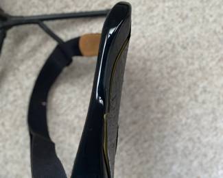 C16 - $250 - Fender Stratocaster Serial # MZ6076392. Model #0134600306. FENDER STD STRAT RW BLK.  05/2006. Has significant cracking all around the black case that surrounds the wooden guitar body. 