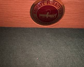 C31 - $250. Bassett Buffet. Measures 62.5" wide x 21.5" deep x 33" tall. Monticello. All drawers slide. Small area on the top that has surface damage - see photo. 