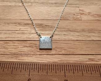 J26 - $150. Gucci Sterling Necklace Square Charm. Tag Reads "Gucci" on Front "Ag925 1313 AR" on Back. 18" Chain. 