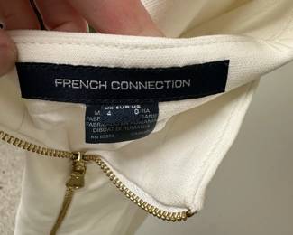 C70 - $15. Size 0 - French Connection White Dress with Gold Accents. 