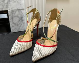 C118 - $175. Size 35. Christian Louboutin Cross Blake Pumps. Excellent Condition. 