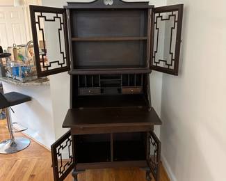 C39 - $150. Crescent Furniture Company. Small Antique Secretary. Measures 29.5" wide x 16" deep x 65.5" tall. Top piece is screwed to the base so it currently moves in one piece. Has been repaired on the bottom left foot. 