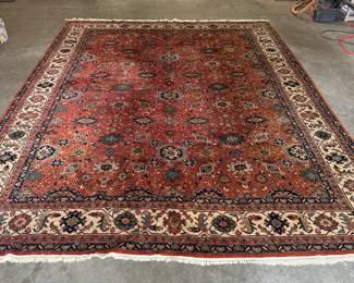 C129 - $250*. 9' x 12' Area Rug. No Tag. Appears to have some sun fading - beautiful colors. 