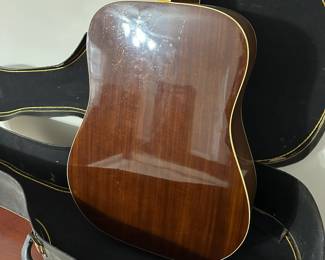 C19 - $175. Vintage Suzuki Guitar No F180-12 with Hard Case. 